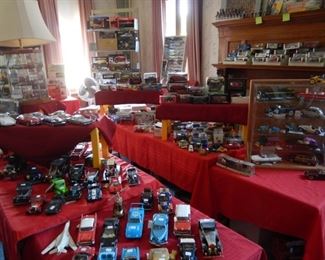 OVERVIEW OF TOY ROOM WITH DIE CAST MODEL CARS BY AUTO ART, MINICHAMPS, PAYA, CORGI & CORGI CLASSICS, WINROSS, SPARK, RIVAROSSI, DANBURY MINT, FRANKLIN MINT AND OTHERS. MODEL TRAINS  BY ROCO, FLEISCHMANN, LILIPUT, ELECTROTRON, BACHMANN & MAGNOS.  MODEL CAR KITS BY RENWAL, MONOGRAM, PYRO, AMT & MORE, OTHER DIE CAST TOYS TOO NUMEROUS TO MENTION.