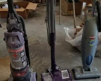 several vaccum cleaners