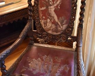 Two antique carved oak armchairs with needlepoint 