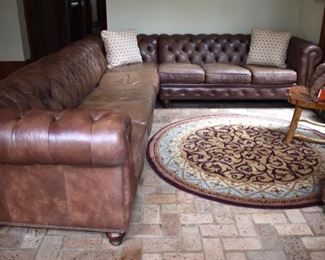 Huge leather sectional sofa. Retailed for around $8,000