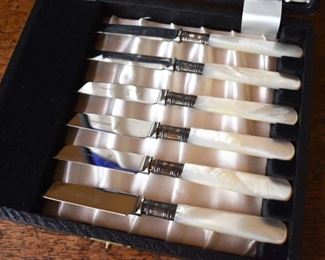 Sterling and mother of pearl knives in presentation box