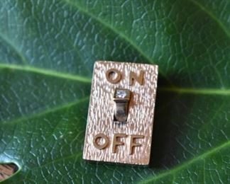 18K and diamond "On/Off Switch" charm