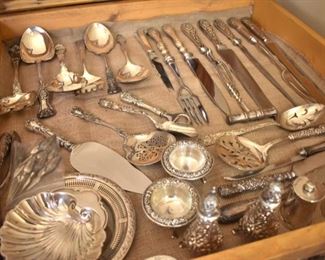 Nice selection of sterling serving pieces - carving sets, repousse pieces, Tiffany & Co. pepper grinder, Gorham nut dish, other Gorham pieces, some antique  