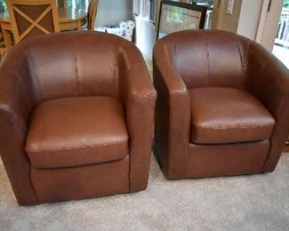 2 LEATHER SWIVEL CHAIRS