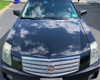 2006 Caddy CtS C6
74000 miles 
Looks brand new and great shape.
