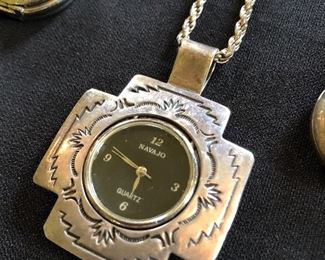 Sterling watch pendant.