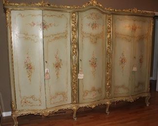 French Antique Handpainted, Gold Gilt Accent 5 Door Armoire (9’W x 7’H x 25”D).  Center section has glass shelves and 5 glass front drawers.