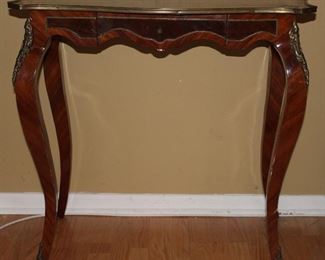 French Ladies’ Writing Desk with Ormolu Brass Mounts and Center Drawer. (32”W x 31.75”H x 19”D)