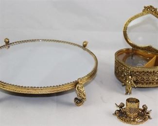 Matson Hollywood Regency Mid Century Gold Plated Mirror Cherub Footed Round Vanity Tray, Bevel Glass Lid Vanity Music Box and Cherub Lipstick Holder