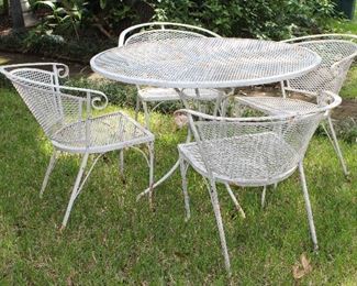 Vintage Mid Century Wrought Iron Mesh Table and 4 Barrel Back Chairs