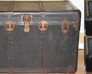 Antique Large Black Steamer Trunk with Brass fitting and complete interior   (36”W x 20”H x  21”D).  Pictures showing open view.