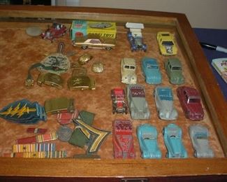Nice collection of old England Dinky cars, and other, boy scout and some military papers, etc.