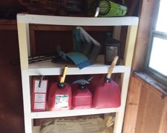 Poulan chain saw, gas cans, large tube sand bags