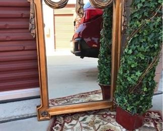 Mirror, Rug, and Topiary