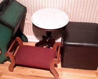 Vintage green sewing box, foot rest and round marble table/plant stand, and brown vinyl foot rest.