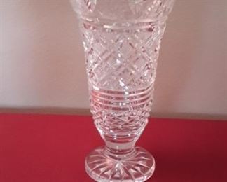 Waterford 7" footed vase with scalloped rim.