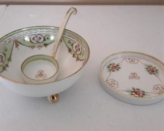 Nippon hand painted footed condiment bowl with ladle and small dish.