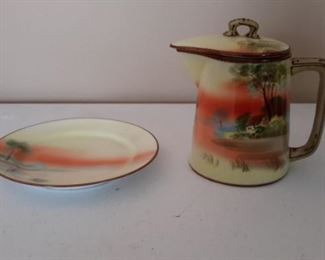 Nippon hand-painted lidded creamer with saucer.
