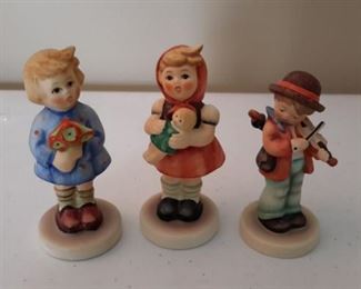 Hummel Goebel "Girl with Nosegay", "Girl with Doll" and boy playing violin.