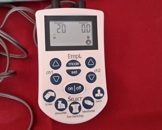 Empi Select TENS unit, complete with extra electrodes in different sizes, user guide and CD.