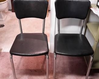 Two Mid-Century Modern chairs.