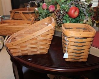 Longberger Baskets with handling cards. From 1992 to 1993, initialed and marked. In excellent condition.