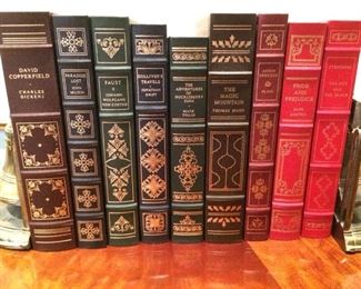 Collection of Ornate Leather Bound Books with Bookends https://ctbids.com/#!/description/share/212886