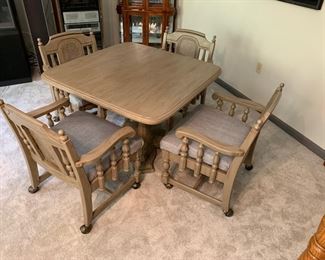 FRESHLY UPHOLSTERED ARM CHAIRS ON WHEELS AND 42" GAME TABLE
