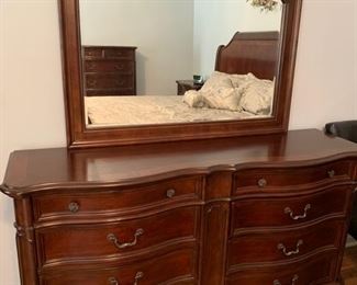 GRAND DOUBLE DRESSER WITH 8 DRAWERS AND MIRROR. LOOK FOR THE SIDE TABLE THAT MATCHES