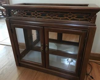 Beautiful Curio with Beveled Glass and Lighting to show off your collectables