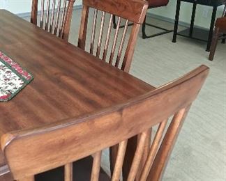 "Contemporary" wooden dining table with 4 chairs and bench seating