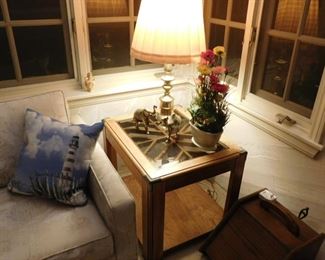 side table with brass lamp