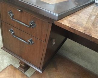 Detail of desk showing lock for drawers, one on each side