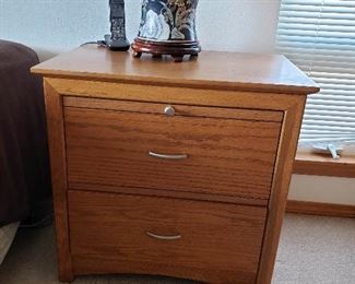One of 4 matching night stands. All have pull out shelf and 2 drawers