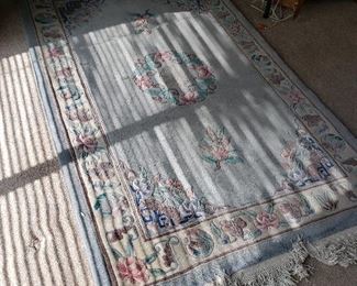 Several wool rugs