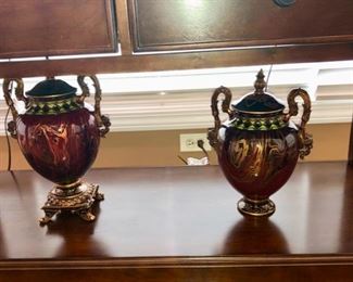 I love these urns. check out the figural heads on the handles.