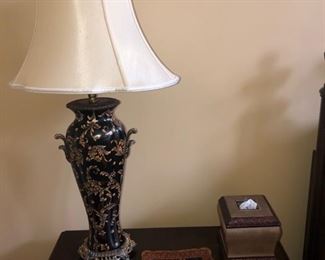 I really admire this lamp - we have two, and the tray with two handles in the center of the photo,