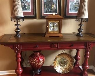 Sweet Console Table with drawer storage and shelf below. Love the signed and numbered prints above from Germany