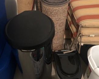 step on waste basket, rug runners, - this is some of the stuff that our homeowner's friend brought over.