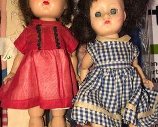 two 1950's or '60's dollies - I think they are Vogue dolls in good condition with original outfits.