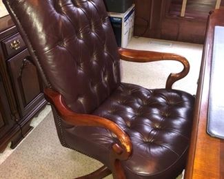 This leather tufted chair by Lexington is really HOT right now.  It rocks and swivels as well