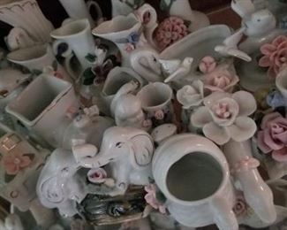Assorted figurines, second shelf https://ctbids.com/#!/description/share/216018