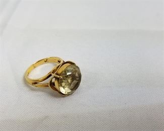 14 Karat Gold Ring with Large Pale Green Jewel Stone https://ctbids.com/#!/description/share/214338