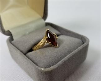 14 Karat Gold Ring with Garnet Gemstone https://ctbids.com/#!/description/share/214366