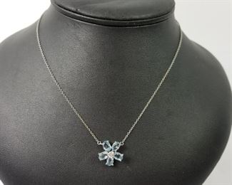 Sky Blue Topaz and Diamond Pendant 14k Gold Necklace. https://ctbids.com/#!/description/share/214365