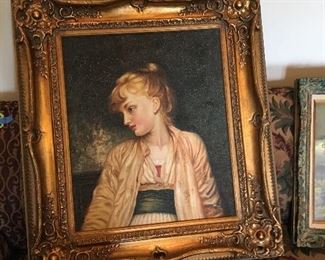 Gold framed young lady painting