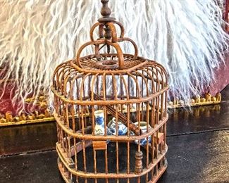 Chinese bird cage with porcelain containers. 9" tall. Estate sale price: $65