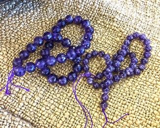 2 sets of dark purple amethyst beads. Larger beads @ $30. Smaller one $20.
