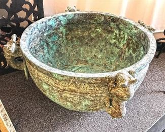 Very large heavy bronze vessel with animal motifs and rings. Over two feet wide and 15 inches tall. $1,500