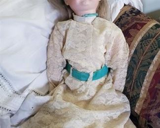 Beautiful bisque doll, 31 inches long, approx date 1910, German made by Armand Marseille, model no on back of head at neck is 390, 14 M